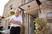 Man stands in front of pub he owns